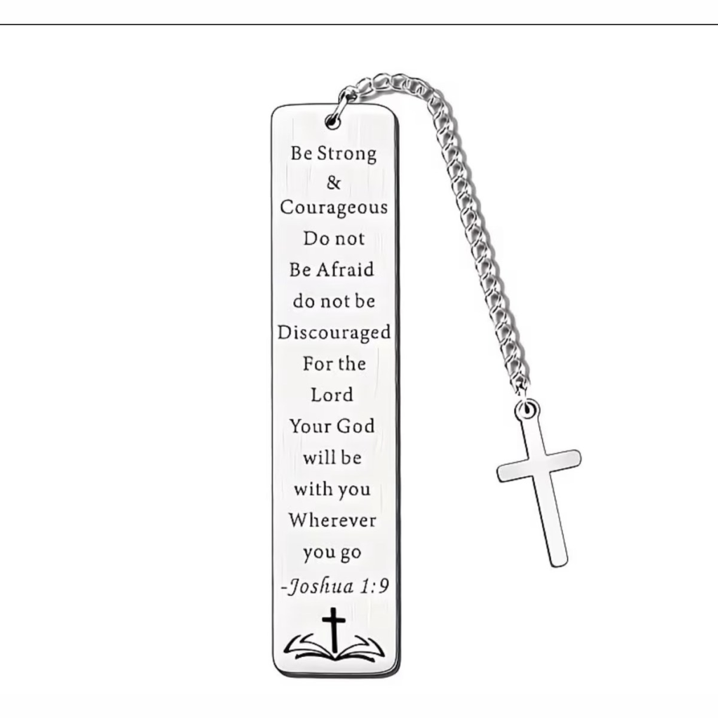 Stainless steel bookmark engraved with Joshua 1:9, Be Strong And Courageous, with a hanging cross charm