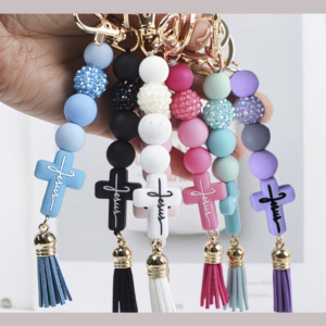 Silicone beaded wristlet keyrings with a Jesus cross charm and tassel in six colours