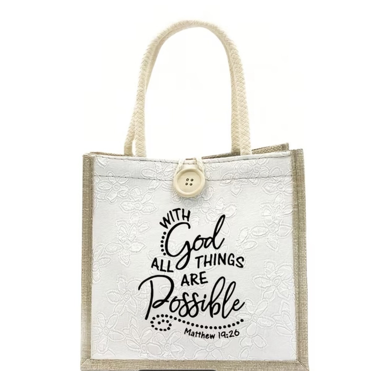 Cream jute and canvas tote bag with a wooden button and the words With God All Things Are Possible, Matthew 19:26